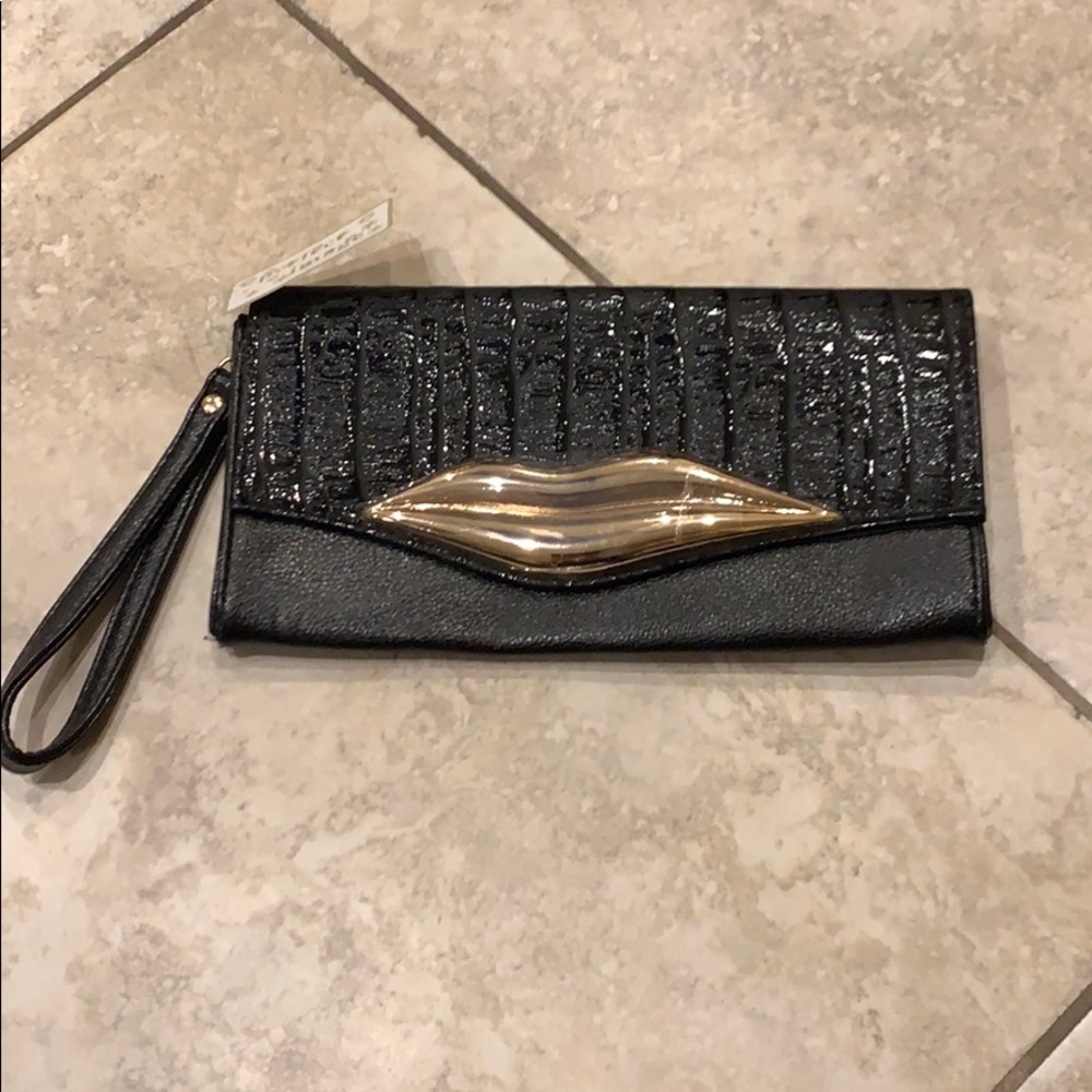 Perfect image black and gold clutch